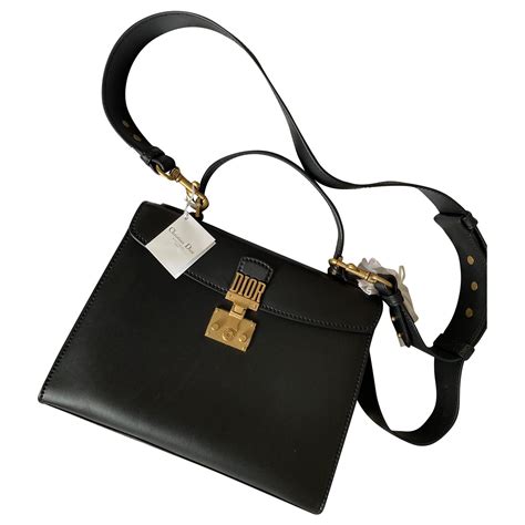 christian dior top handle bag.